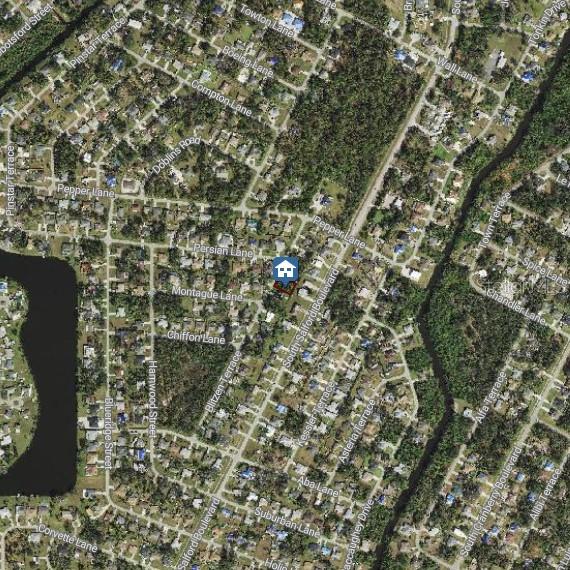 This is an aerial map view of a residential neighborhood with a house icon marker — BLITZEN TERRACE, NORTH PORT, FL