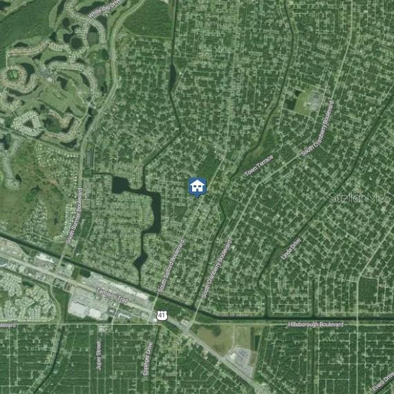 This is an aerial map view of a residential neighborhood with a house icon marker — BLITZEN TERRACE, NORTH PORT, FL
