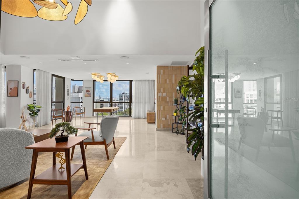 A bright, open-concept living area features light tile floors, modern furniture, and floor-to-ceiling windows — 1212 LUCHETTI ST UNIT PH, SAN JUAN, PR