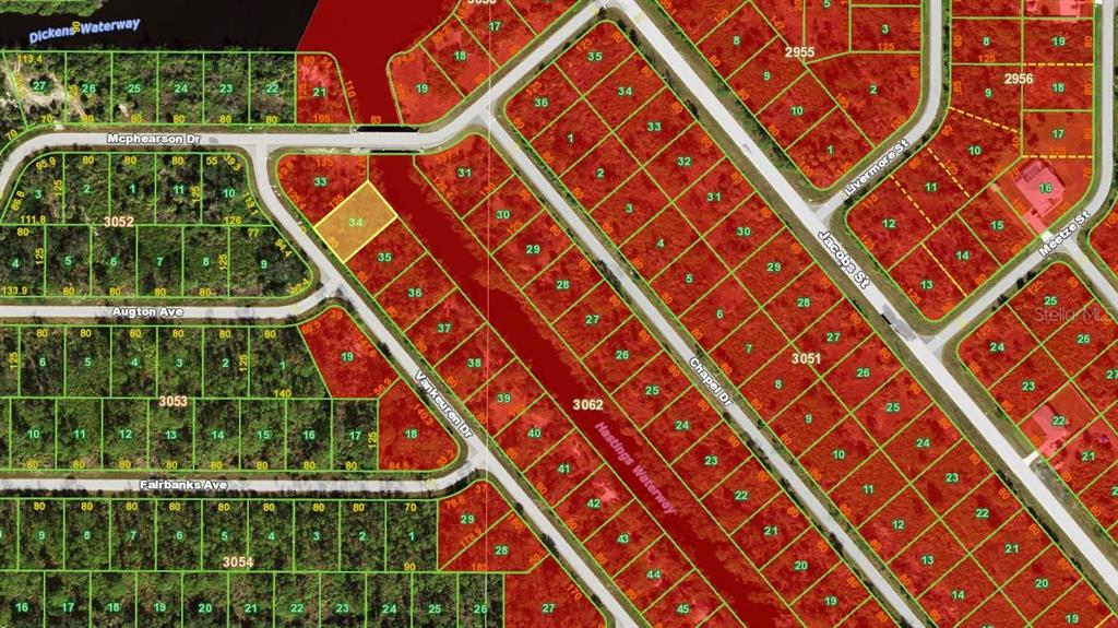 This is a land development map showing residential lots, streets, and waterways — 2336 VANKEUREN DRIVE, PORT CHARLOTTE, FL