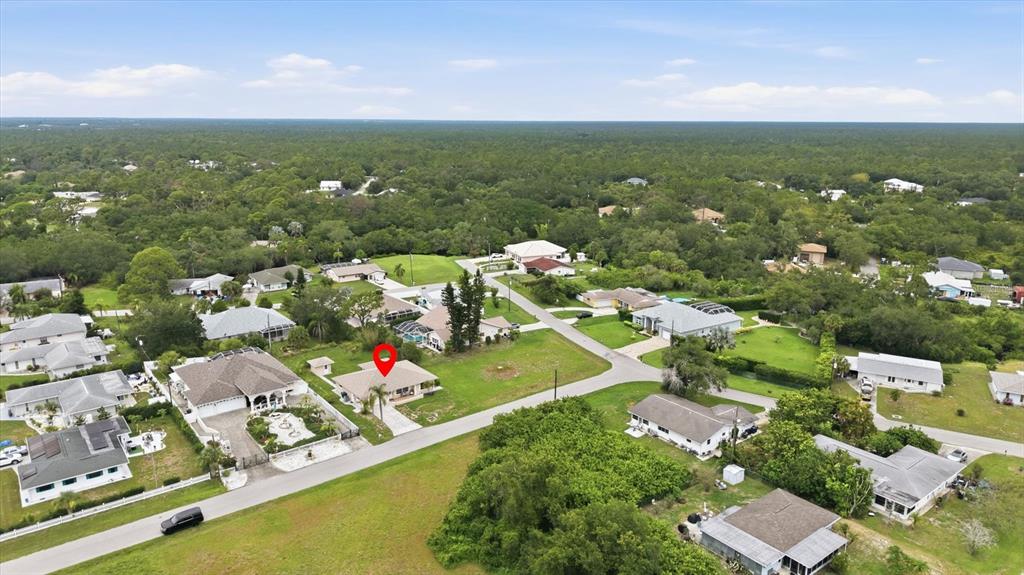An aerial view shows a single-story house with a red location pin in a suburban neighborhood — 320 SAN RAFAEL AVENUE, NORTH PORT, FL