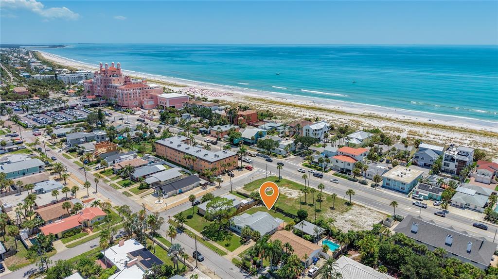 An aerial view shows a coastal neighborhood with a vacant lot marked by a pin — 3602 CASABLANCA AVENUE, ST PETE BEACH, FL