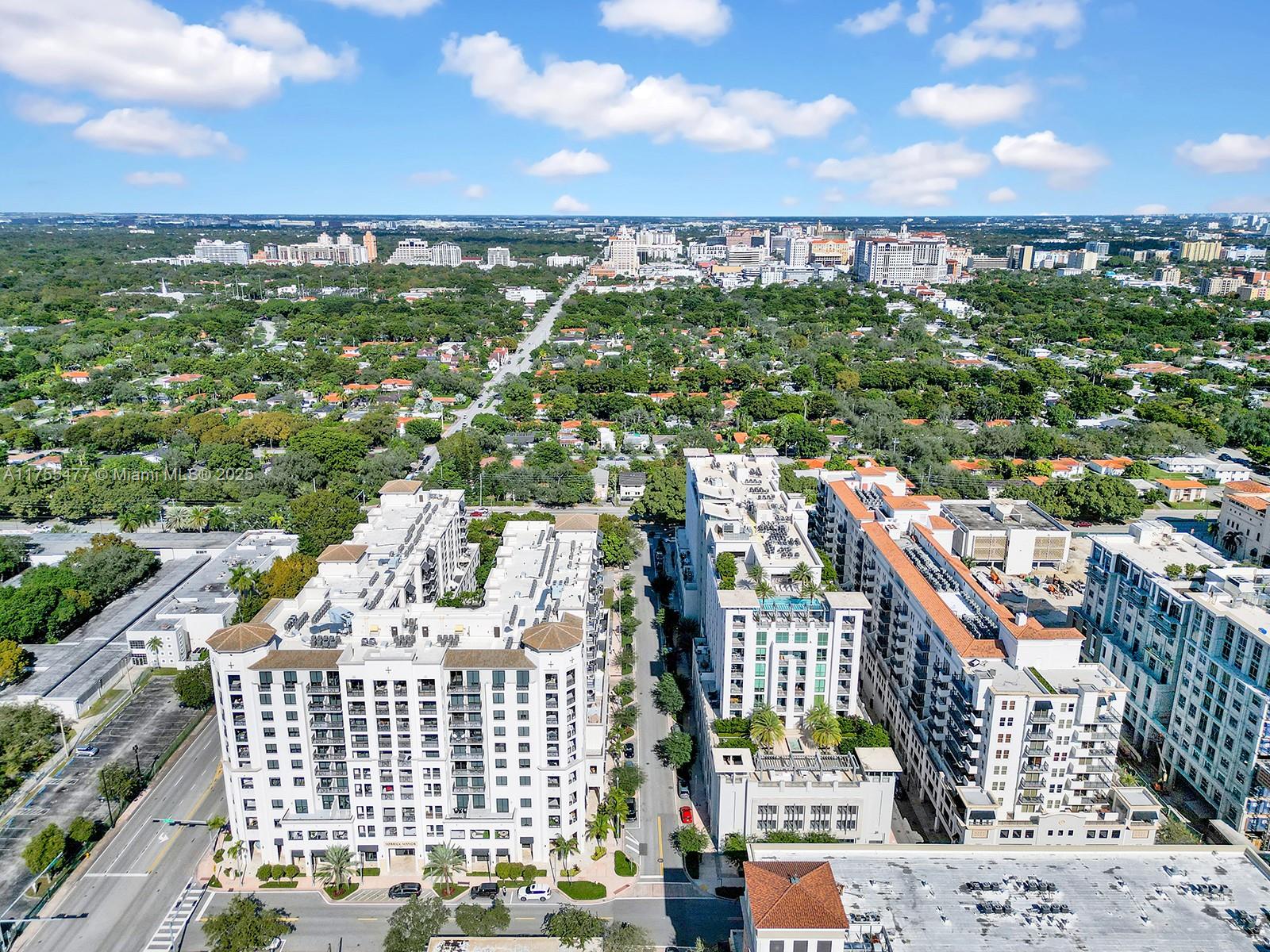 An aerial view shows two large, multi-story apartment buildings separated by a street — 4070 Laguna St, Coral Gables FL 33146, CORAL GABLES, FL