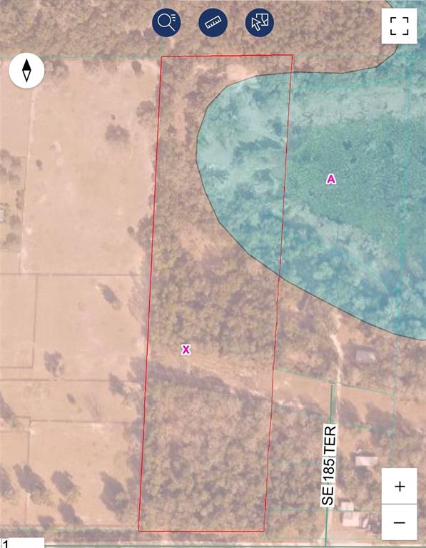 This is a map showing a rectangular parcel of land with a wooded area — 18545 SE 115TH STREET, OCKLAWAHA, FL