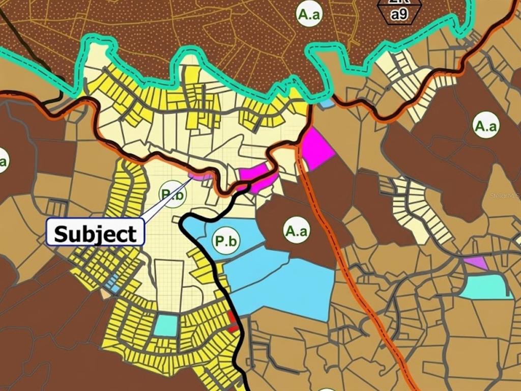 This is a land use or zoning map showing a subject property highlighted in a residential area — Carr 568 Km 30.3 Int CARR 568 KM 30.3 INT, COROZAL, PR 00783, COROZAL, PR
