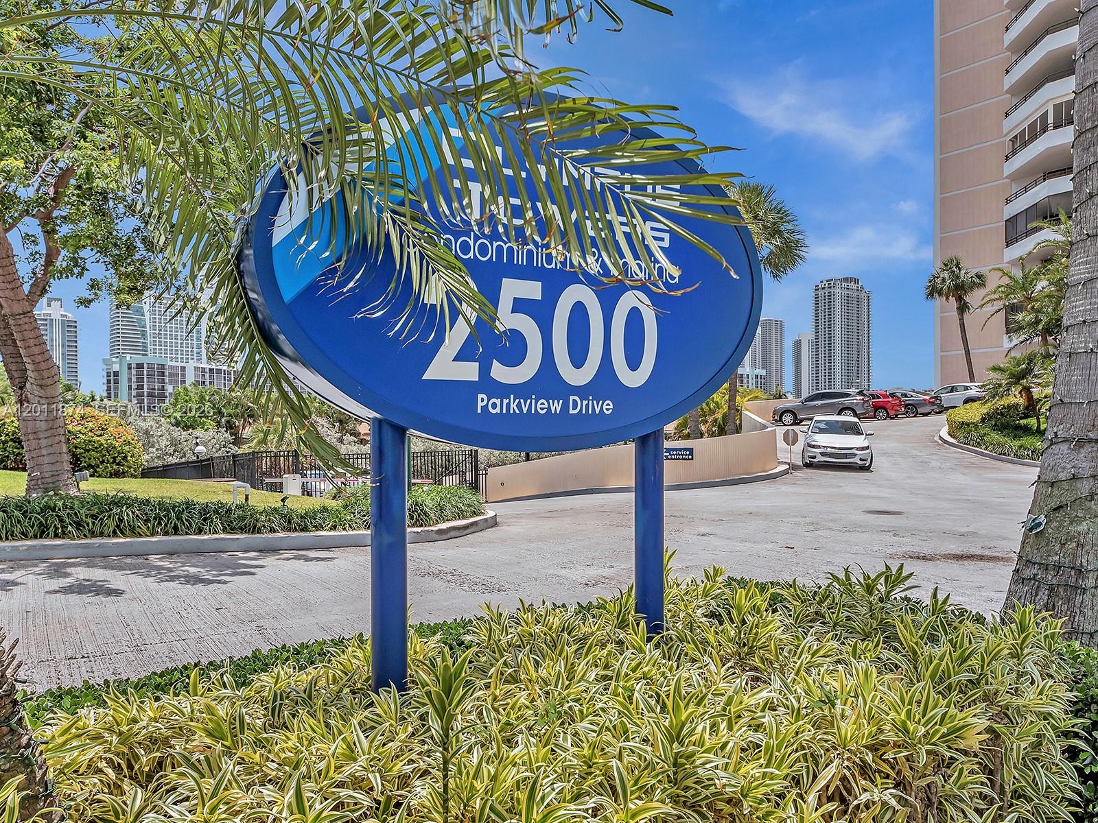 A blue oval sign displays the address 2500 Parkview Drive in front of a high-rise building — 2500 Parkview Dr # 1219, Hallandale Beach FL 33009, HALLANDALE BEACH, FL