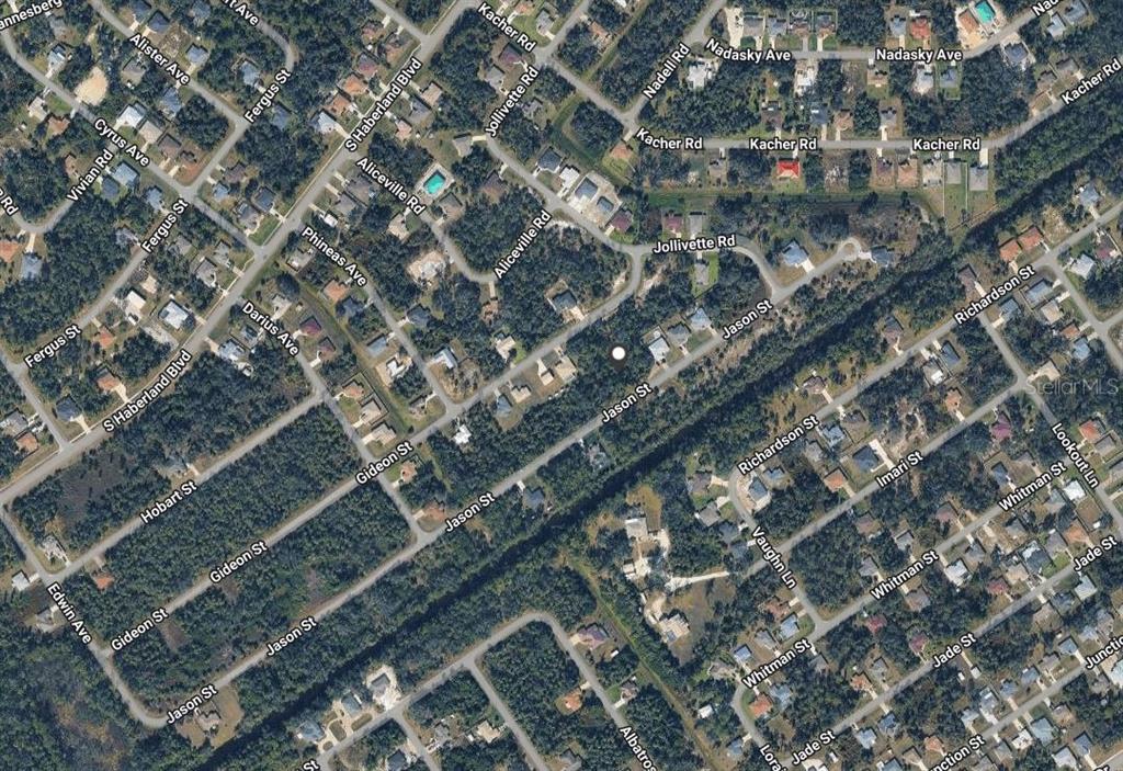 This is an aerial map view of a residential neighborhood with various streets and houses — JASON STREET, NORTH PORT, FL
