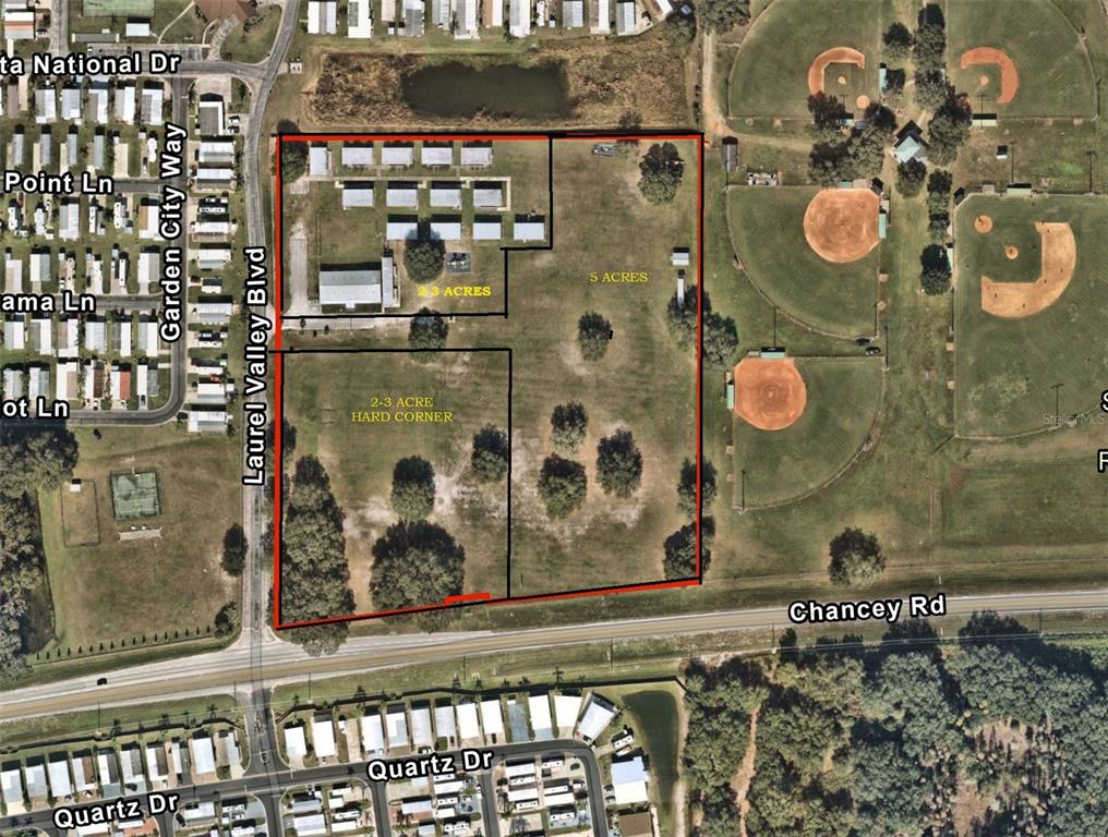 This aerial map shows a large, multi-sectioned plot of land bordered by roads and baseball fields — 39735 CHANCEY ROAD, ZEPHYRHILLS, FL