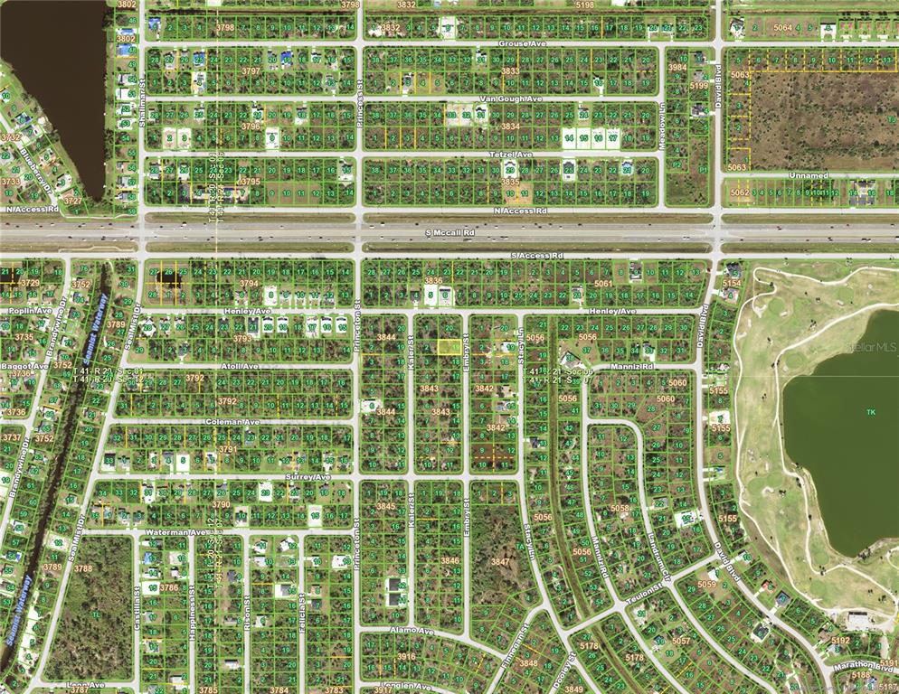 This is an aerial map showing residential lots and streets in a suburban neighborhood — 6987 EMBRY STREET, PORT CHARLOTTE, FL