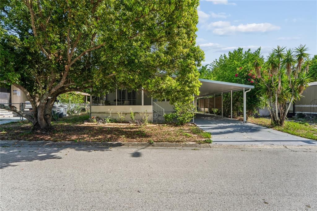 This is a floor plan showing the layout of a house with a carport and porch — 6601 SUTHERLAND AVE, NEW PORT RICHEY, FL