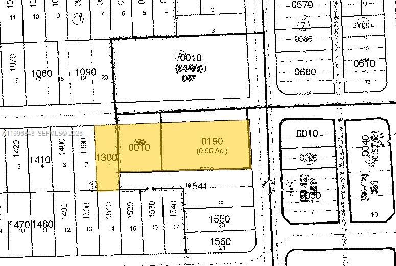 This is a property tax map showing highlighted land parcels with their associated identification numbers — 7460 Biscayne Blvd, Miami FL 33138, MIAMI, FL