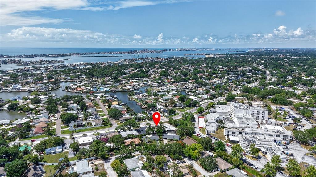 An aerial view shows a residential neighborhood with a red location pin marking a property — 2039 INDIAN ROCKS ROAD S, LARGO, FL