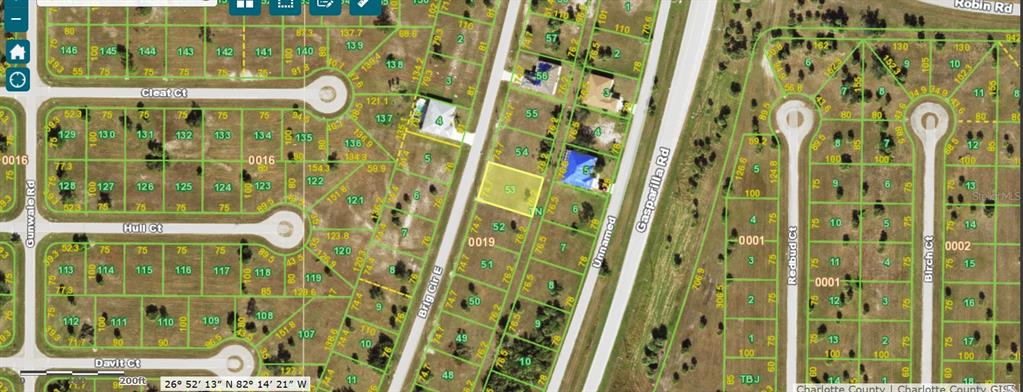 This is a satellite map showing a highlighted vacant residential lot in a suburban neighborhood — 17 BRIG CIRCLE E, PLACIDA, FL