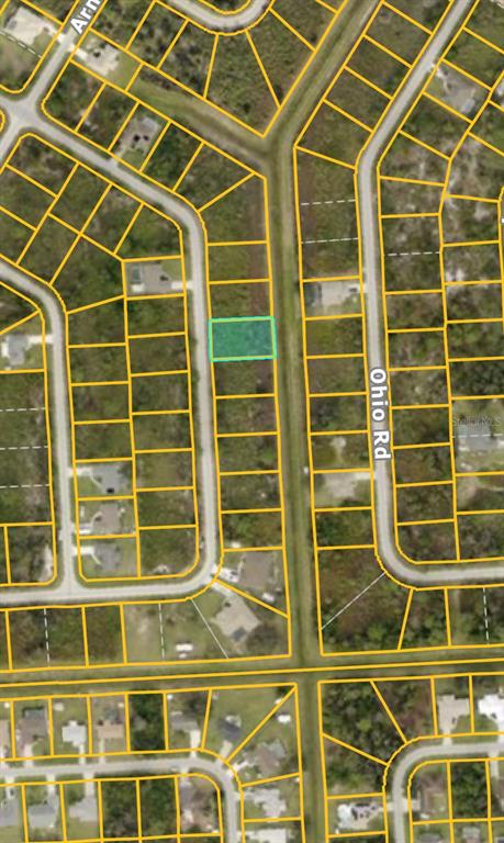 An aerial map view shows a highlighted rectangular vacant lot in a residential neighborhood — CALLAGHAN LANE, NORTH PORT, FL
