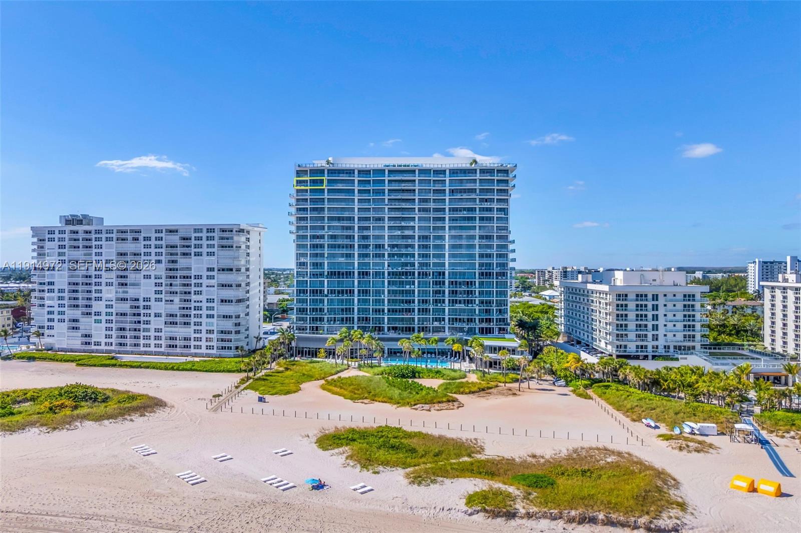 An aerial view shows a tall beachfront condominium building with a highlighted balcony unit — 1116 N Ocean Blvd, Pompano Beach FL 33062, POMPANO BEACH, FL