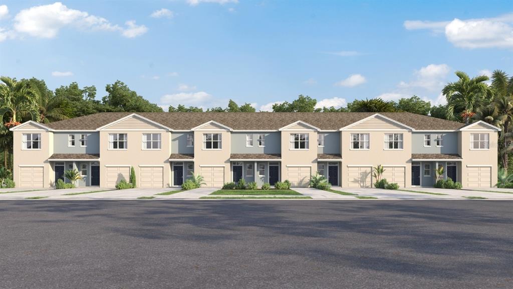 A digital rendering of a multi-unit townhouse building with beige siding and attached garages — 31185 MIDNIGHT SUN WAY, WESLEY CHAPEL, FL