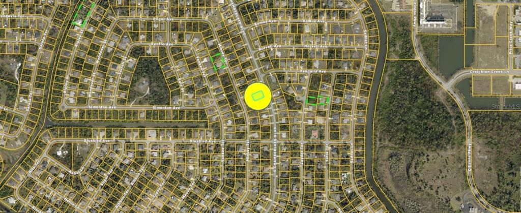 This is an aerial map showing residential lots and streets in a suburban neighborhood — S CHAMBERLAIN BOULEVARD, NORTH PORT, FL