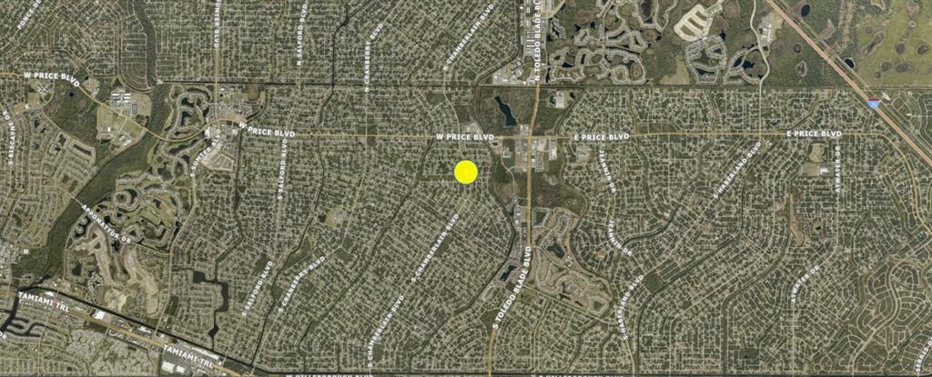 This is an aerial map showing a residential area with a yellow dot indicating location — S CHAMBERLAIN BOULEVARD, NORTH PORT, FL