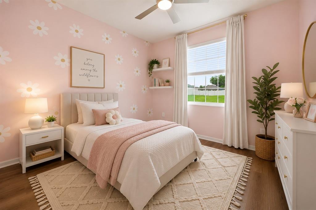 A bedroom with pink daisy-patterned walls, a bed, a nightstand, and a window with curtains — 1581 NE 50TH TERRACE, OCALA, FL