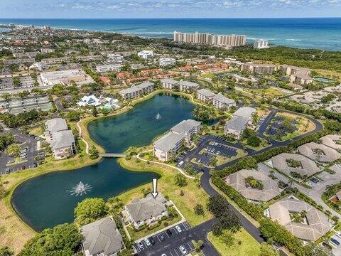An aerial view shows a residential complex with two lakes and a marked building — 353 S Us Highway 1 # A407, Jupiter FL 33477, JUPITER, FL