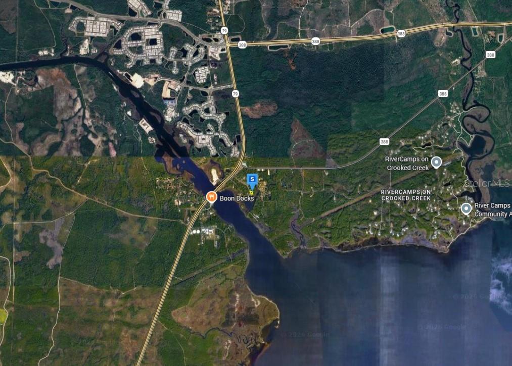 This is a satellite map showing a waterfront community near a highway and river — 7905 RANDOM ROAD, PANAMA CITY BEACH, FL