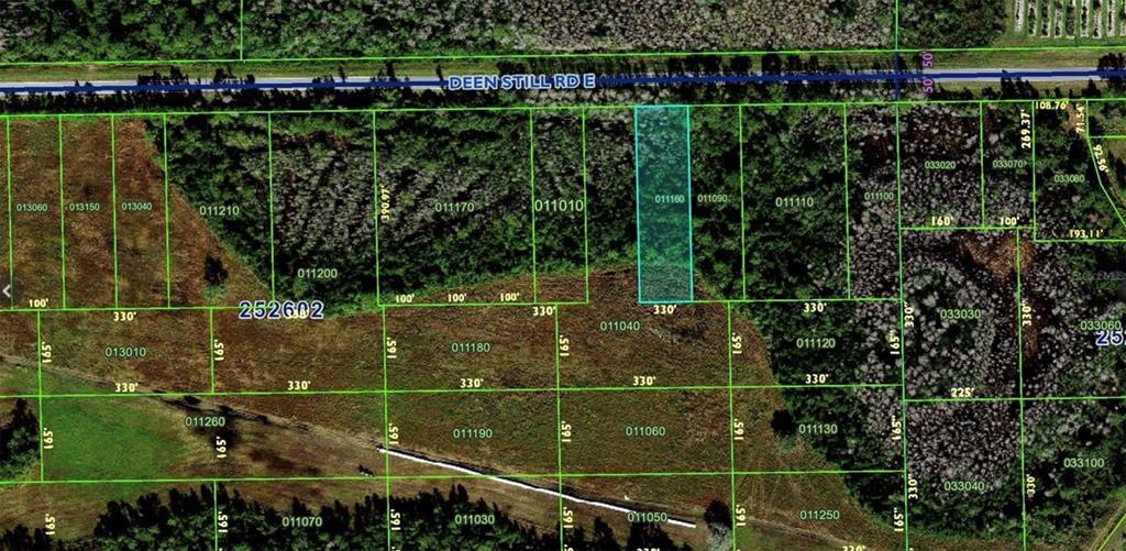 This is a satellite map showing property parcel boundaries and lot numbers — DEEN STILL ROAD E, POLK CITY, FL