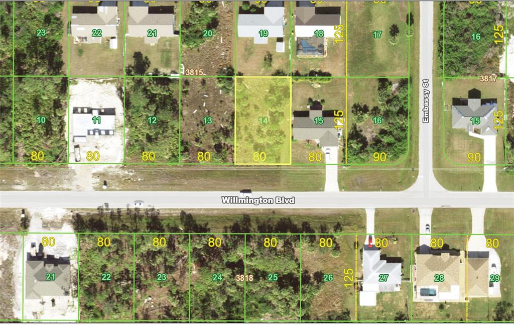 This is an aerial map showing residential lots and houses along Willmington Blvd and Embassy St — 11642 WILLMINGTON BOULEVARD, PORT CHARLOTTE, FL