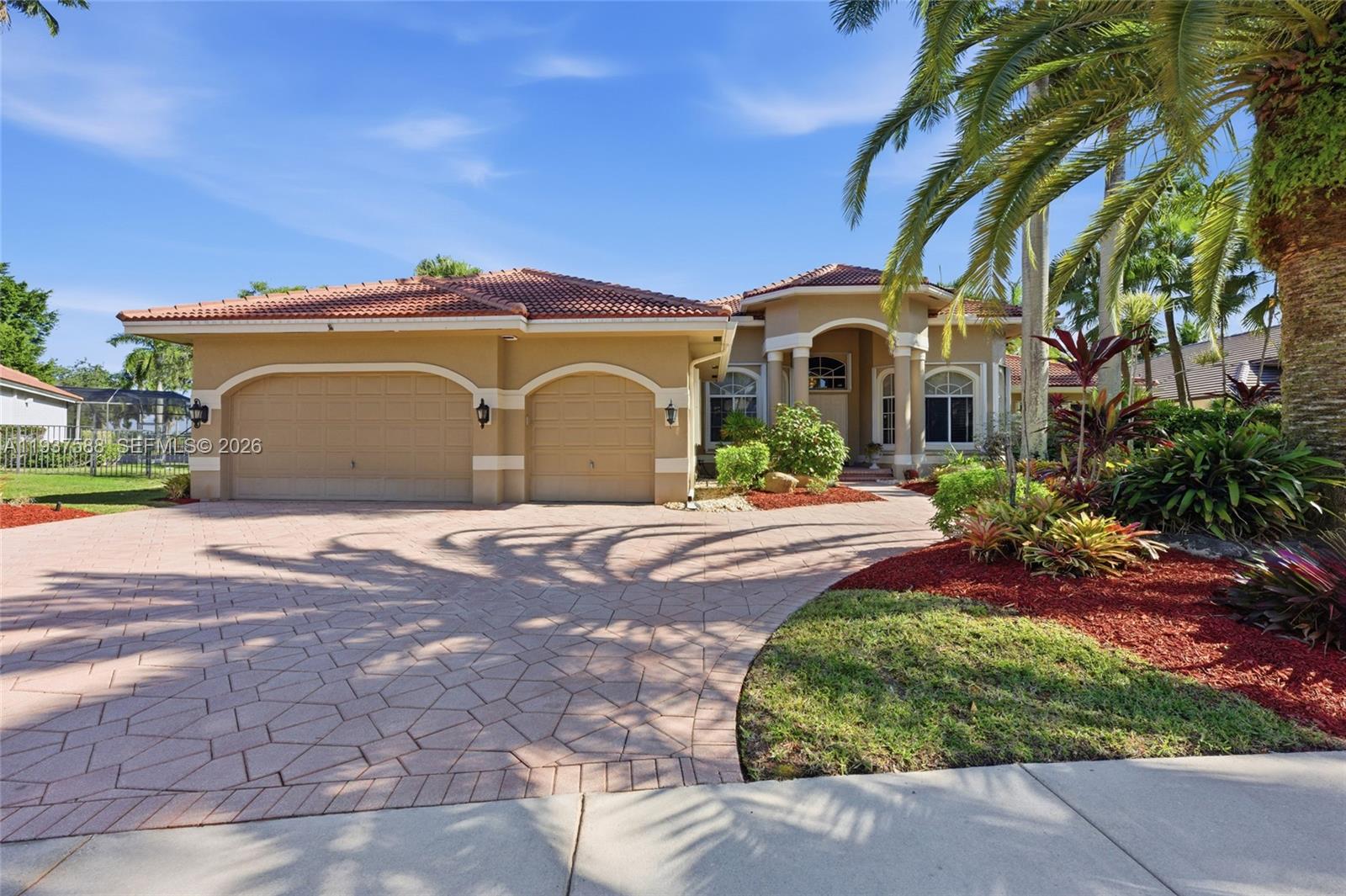 2442 Poinciana Ct, Weston FL 33327