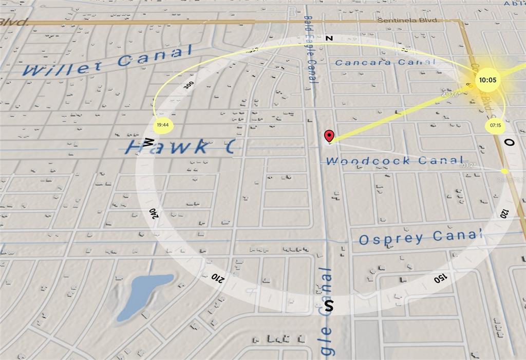 This is a map showing a residential area with several canals and street names — 216 GENOA AVENUE S, LEHIGH ACRES, FL