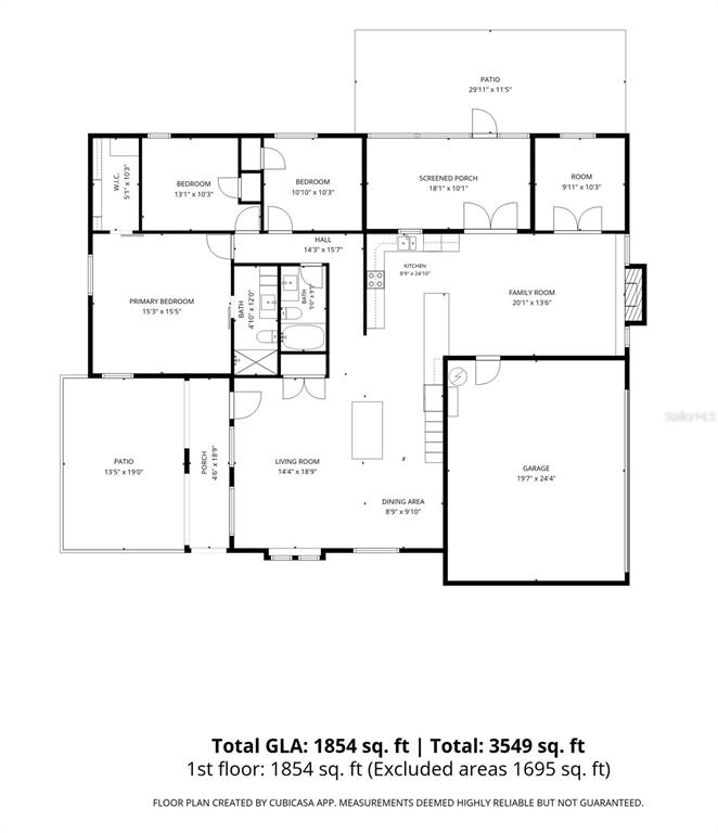 This floor plan shows a single-story house with a garage, multiple bedrooms, and outdoor patios — 1809 STELLA COURT N, LAKELAND, FL