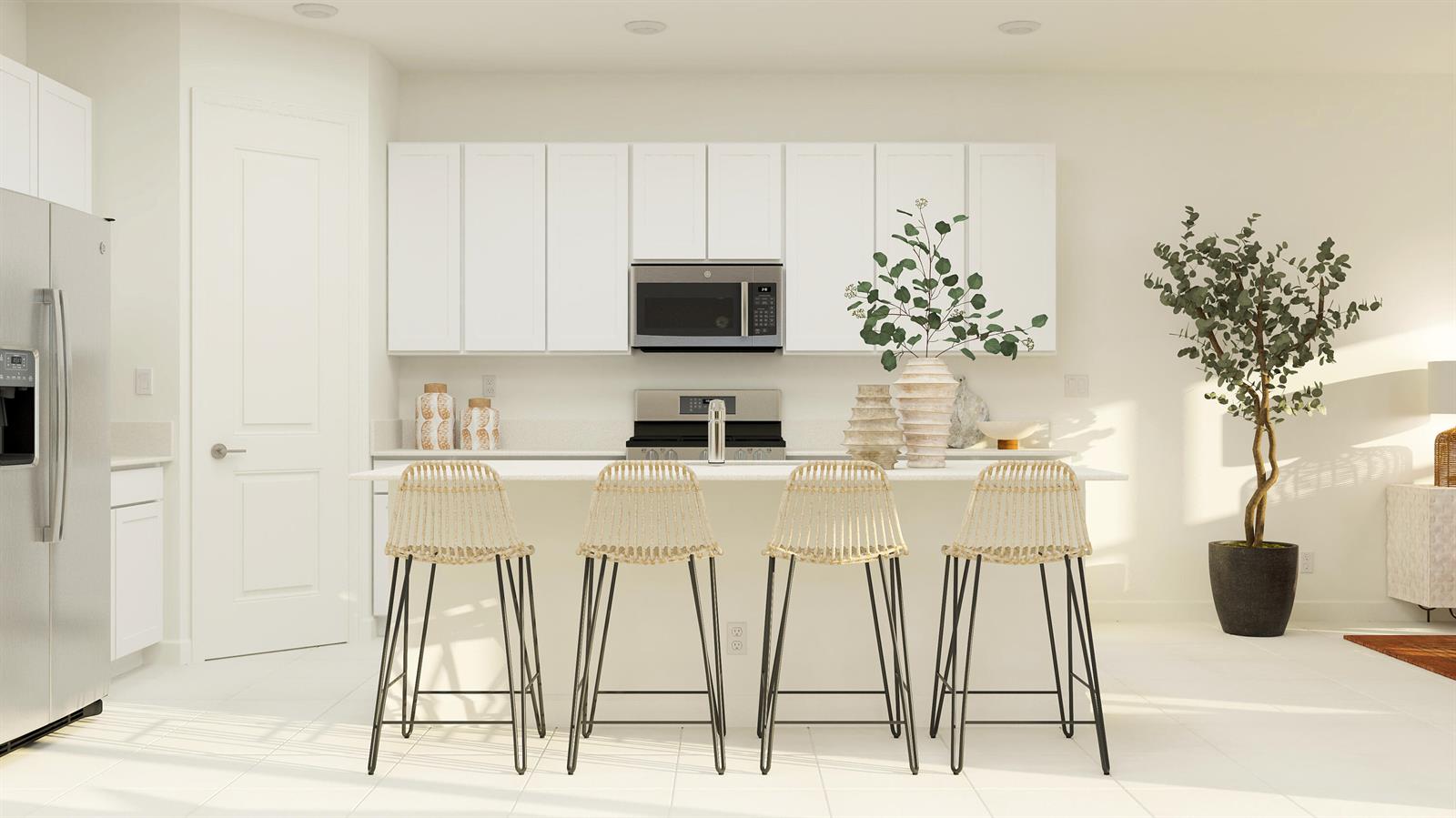 A modern kitchen features white cabinets, stainless steel appliances, a central island, and four barstools — 19087 Wood Stork Way, FL 33470, FL