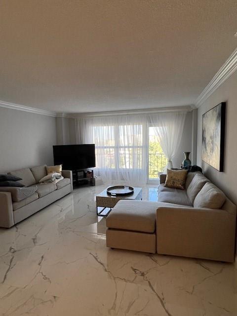 A living room features a sectional sofa, a sofa, a coffee table, and marble flooring — 405 N Ocean Boulevard # 825, Pompano Beach FL 33062, POMPANO BEACH, FL