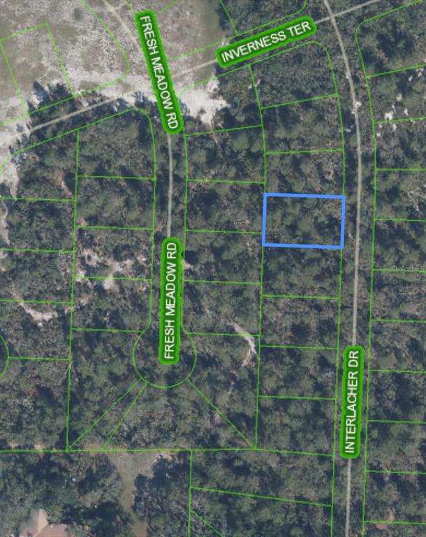 This is an aerial map showing a rectangular plot of land highlighted in blue — 10640 INTERLACHER DRIVE, SEBRING, FL