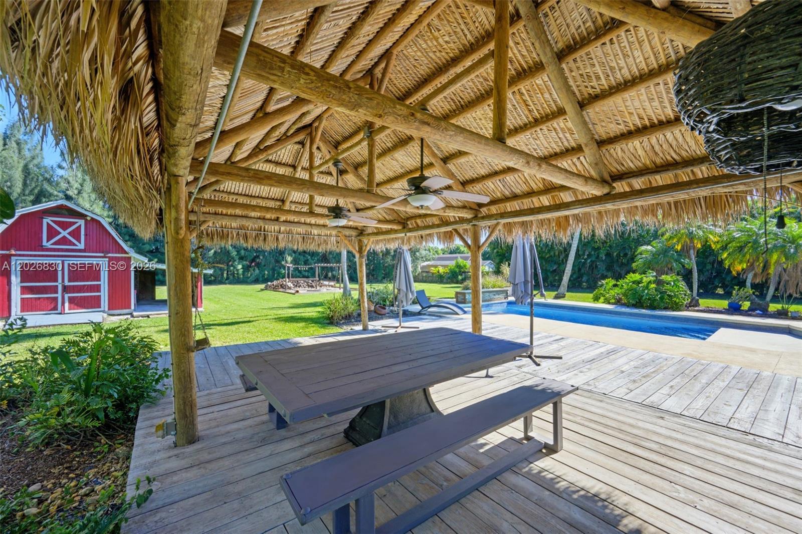 An aerial view shows a house with a pool and circular driveway on a large lot — 5300 SW 162nd Ave, Southwest Ranches FL 33331, SOUTHWEST RANCHES, FL