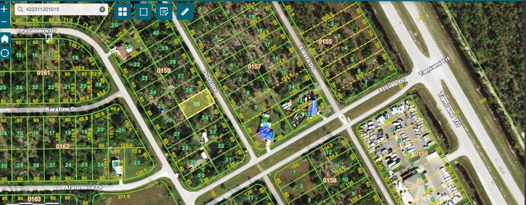 This is a satellite map view showing residential lots and streets in a suburban neighborhood — 12593 GUCCI DRIVE, PUNTA GORDA, FL