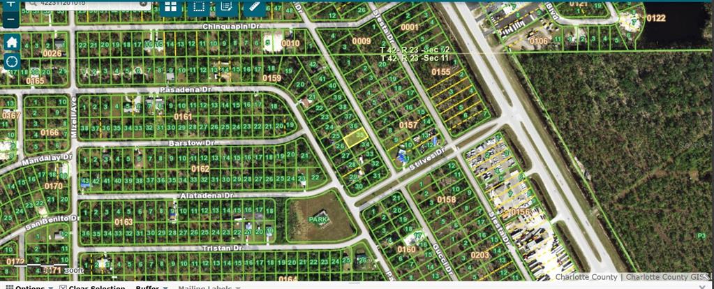 This is a satellite map showing residential lots and streets in a suburban neighborhood — 12593 GUCCI DRIVE, PUNTA GORDA, FL