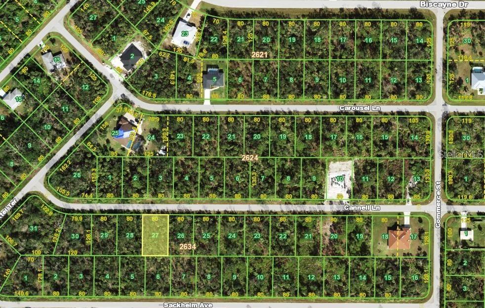 This is an aerial map showing residential land parcels and streets in a suburban neighborhood — 14315 CANNEL LANE, PORT CHARLOTTE, FL