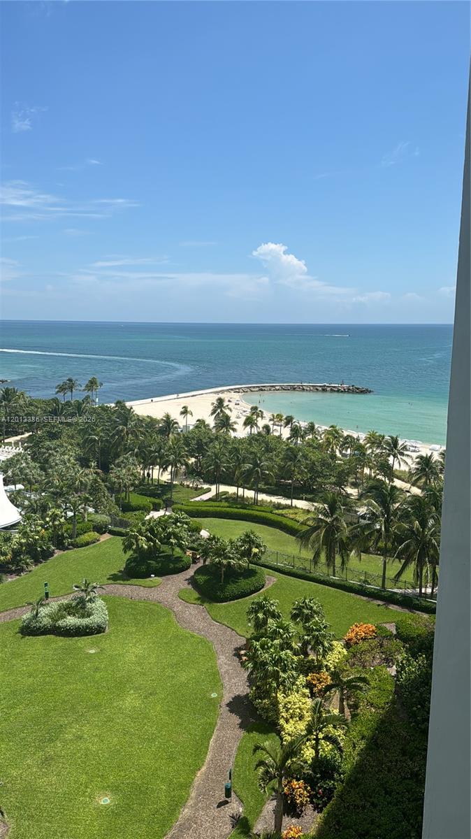 An elevated view of a lush green park, sandy beach, and the ocean — 10275 Collins Ave # 901, Bal Harbour FL 33154, BAL HARBOUR, FL