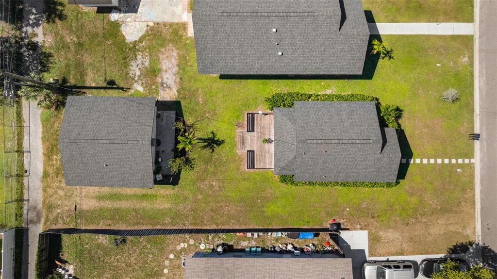 An aerial view shows a vacant lot next to several houses in a residential neighborhood — 2722 14TH AVENUE S, ST PETERSBURG, FL