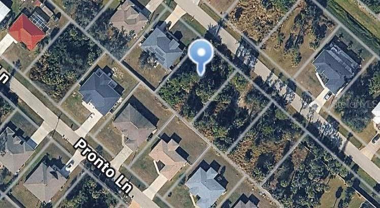 This is an aerial map view of a residential lot marked with a location pin — COVER LANE, NORTH PORT, FL