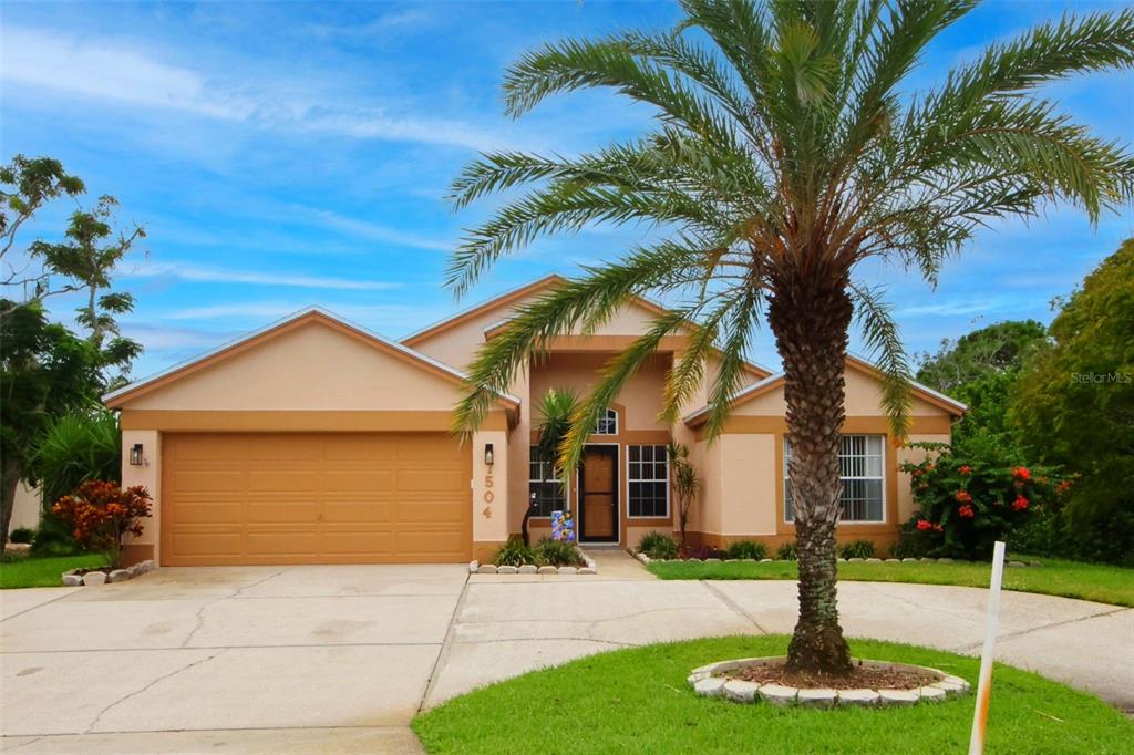 7504 BEACON WOODS DRIVE