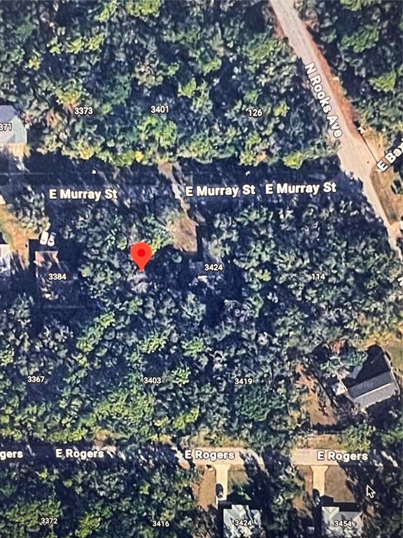 This is an aerial map view showing a wooded residential area with several houses — 3404 E MURRAY STREET, INVERNESS, FL