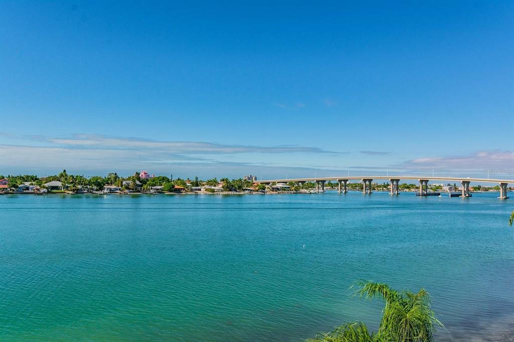 A view of a bridge spanning a wide body of water with houses along the shore — 6085 BAHIA DEL MAR CIRCLE UNIT 468, ST PETERSBURG, FL