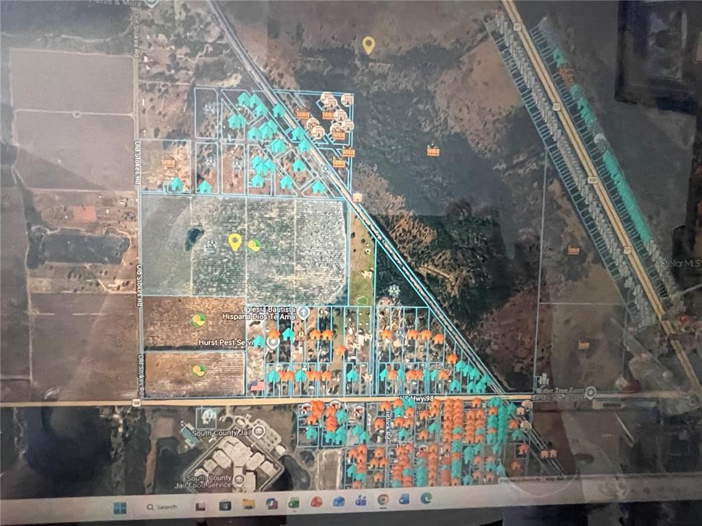 This is a satellite map showing property boundaries, residential icons, and local landmarks — 770 OLD STOKES ROAD, FROSTPROOF, FL