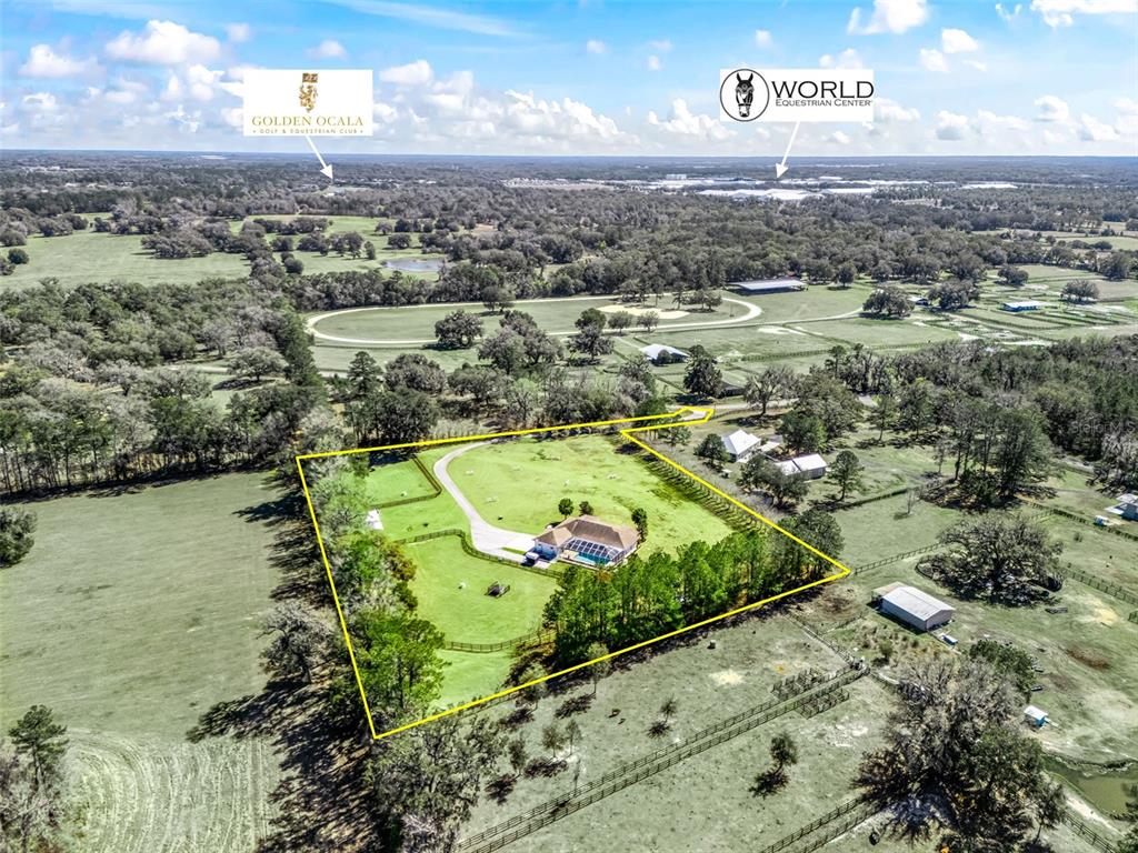 An aerial view shows a house with a pool inside a yellow-outlined property boundary — 3030 NW 95TH AVENUE ROAD, OCALA, FL