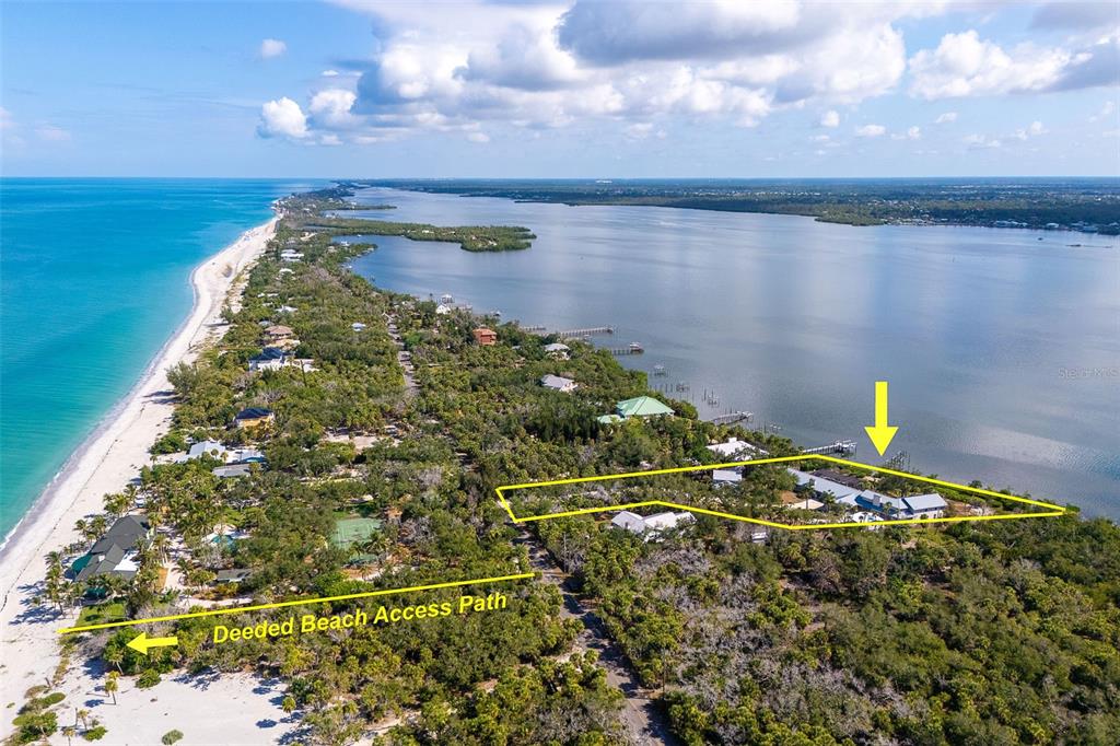 An aerial view shows a coastal property with a private dock and beach access path — 6275 MANASOTA KEY ROAD, ENGLEWOOD, FL