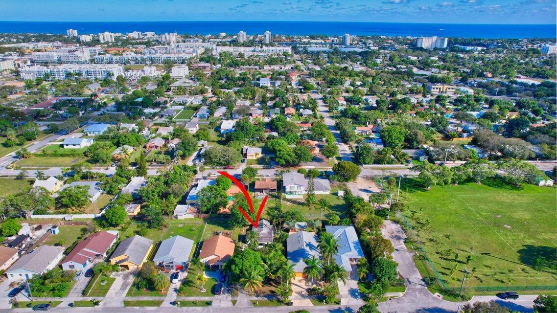 An aerial view of a residential neighborhood with a red arrow pointing to a house — 237 SW 3rd Avenue, Delray Beach FL 33444, DELRAY BEACH, FL