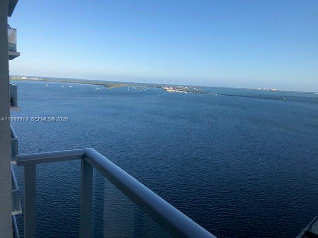 A high-angle view of a large body of water from a balcony — 1155 BRICKELL BAY DR # 2309, Miami FL 33131, MIAMI, FL