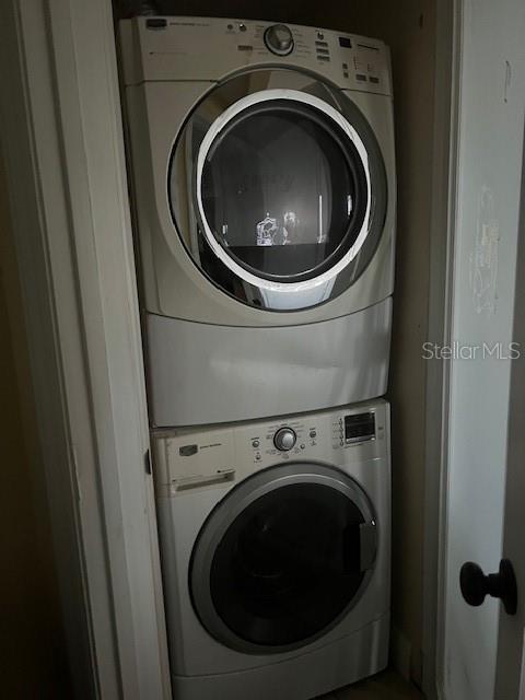 A stacked washer and dryer unit is installed inside a small closet — 195 MAE STREET UNIT B, EUSTIS, FL