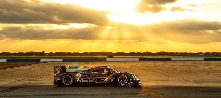 A race car drives on a track during a sunset with a cloudy sky — 248 Suwanner Drive, Lake Placid FL 33852, LAKE PLACID, FL